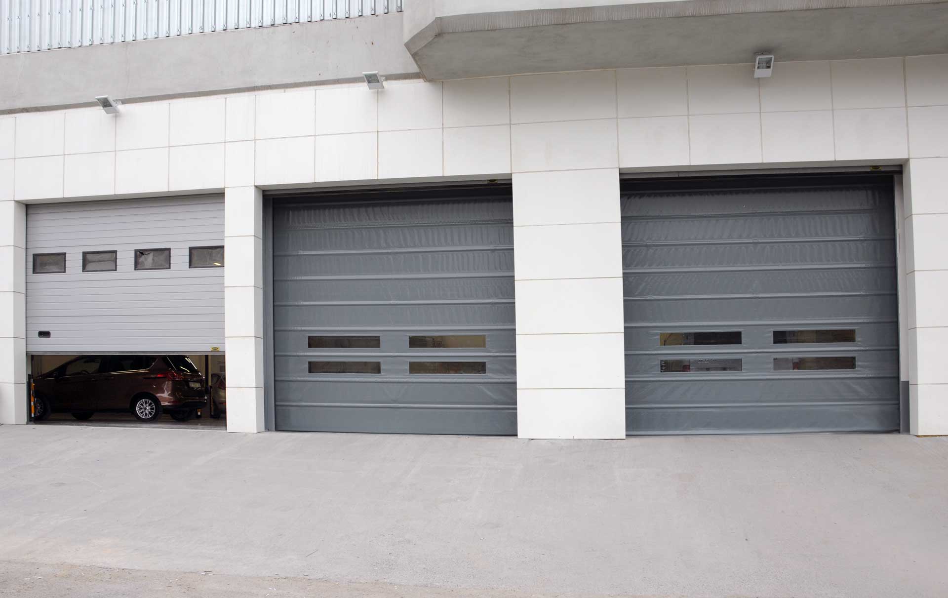 VOLVO CARS – SECTIONAL DOORS & HIGH SPEED PVC ROLLER SHUTTER DOORS